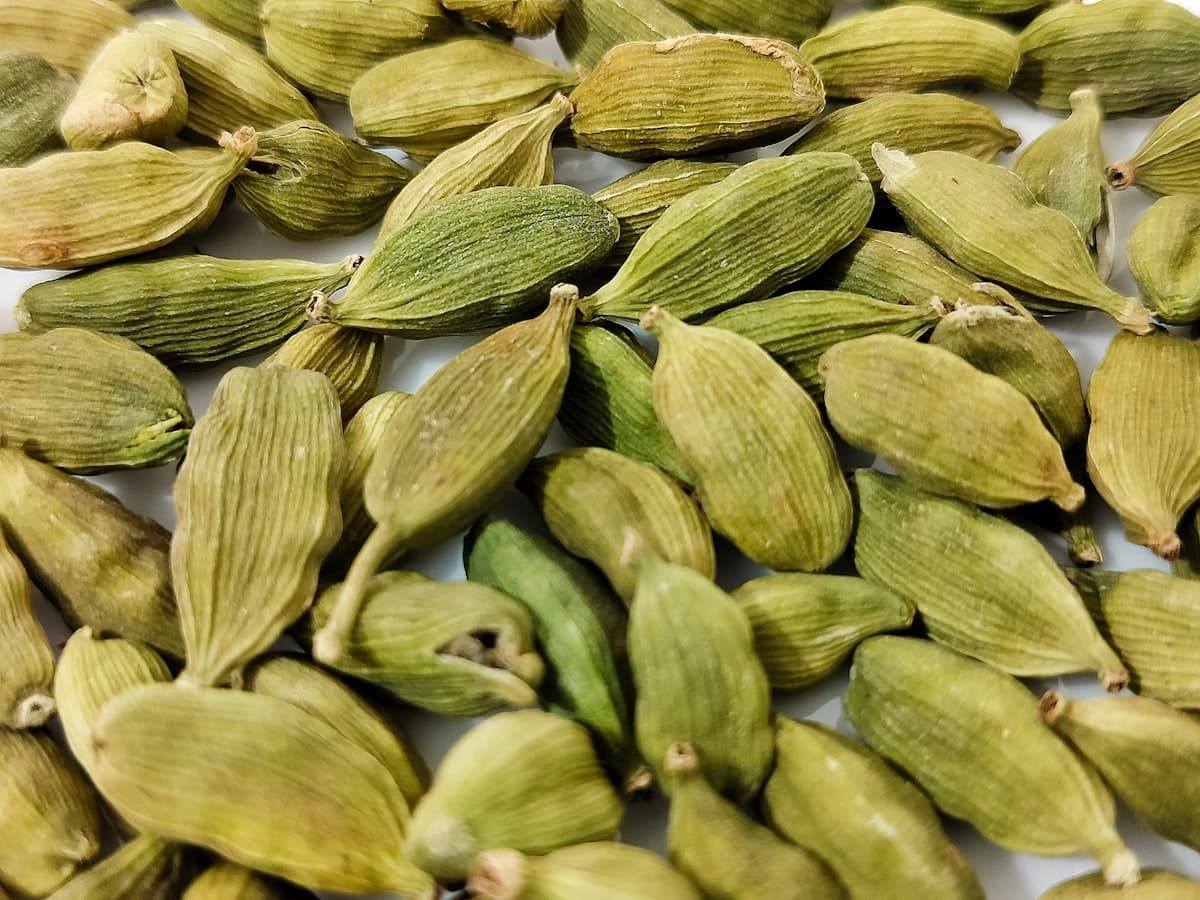 Green cardamom pods, graded by size before export.
