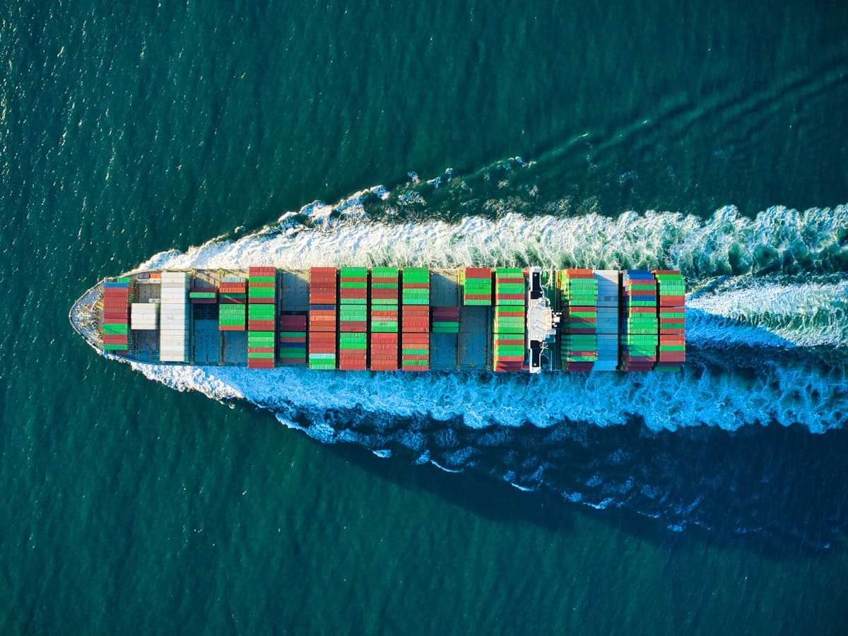 Container vessel underway — the CIF and CFR leg of a shipment.